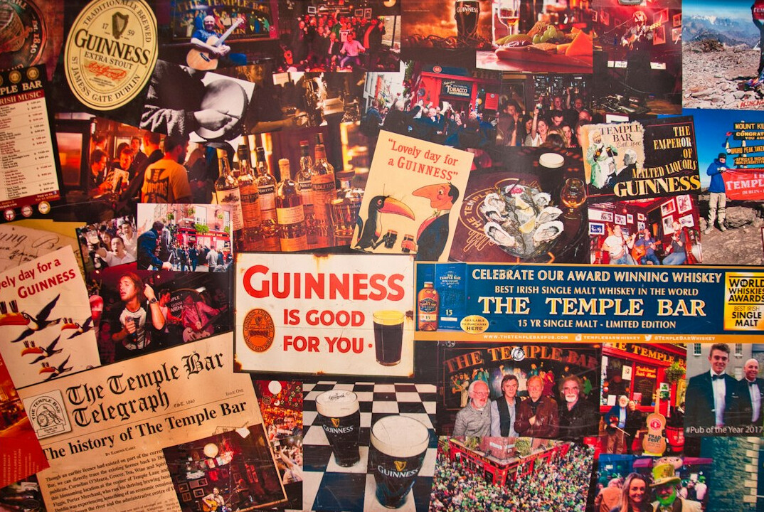 Wall covered with vintage advertising posters